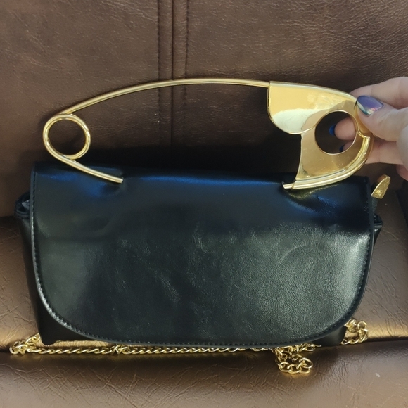 Elegant Black Clutch with Gold Accent - Picture 2 of 4